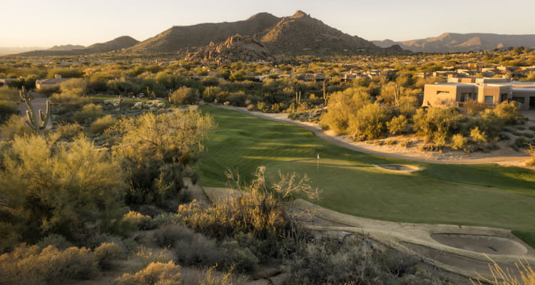 phoenix golf course with some desert landscape and mountainous background