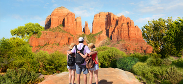 family hiking in sedona viewing red rock formations