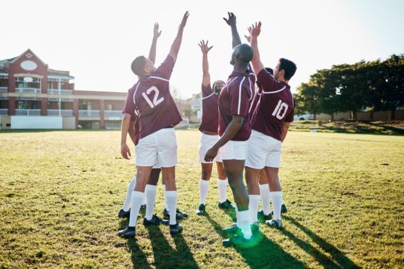 a team cheering on a field in phoenix