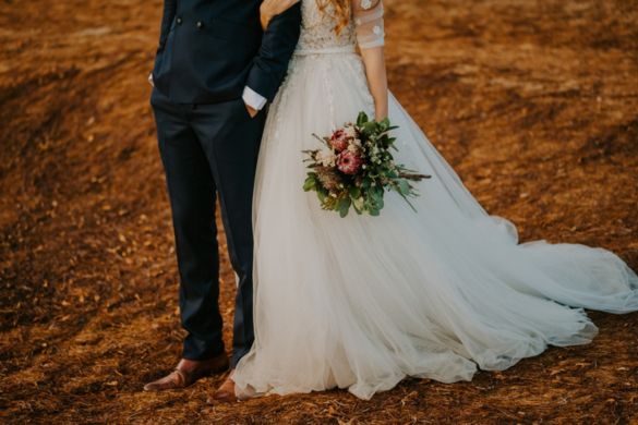 bride and groom with the arizona desert in the background